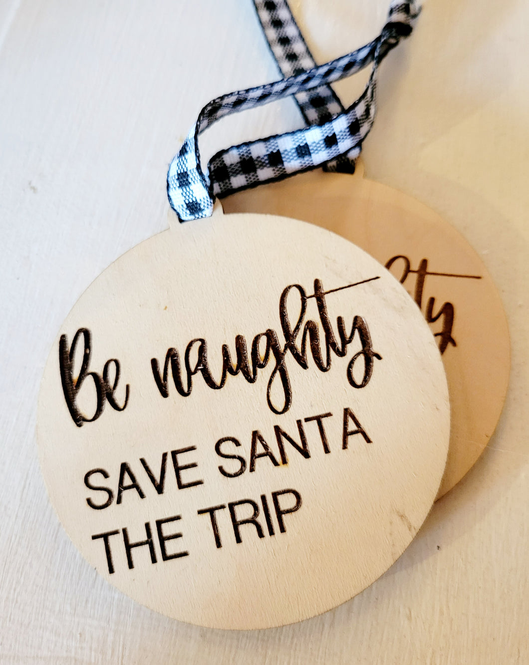 Be Naughty. Save Santa the Trip Ornament